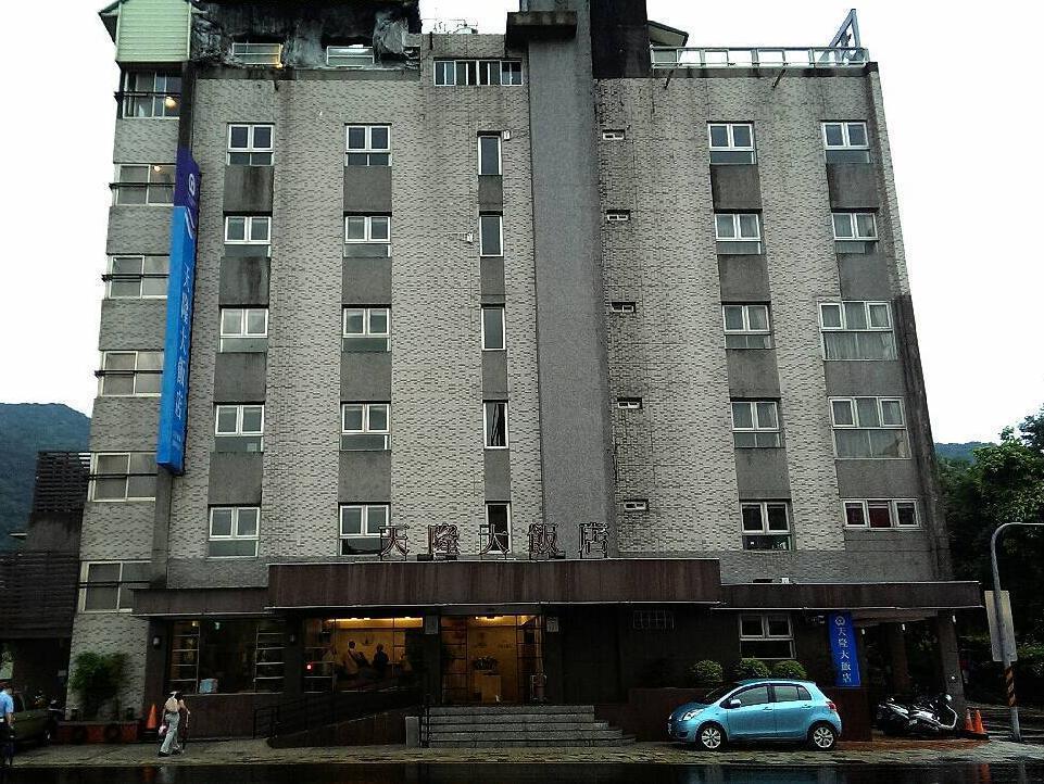 Tian Long Hotel Цзяоси Экстерьер фото